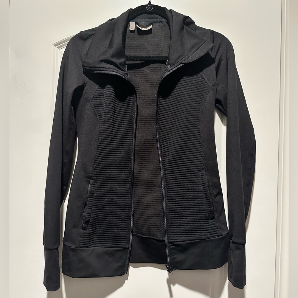 Athleta size XS black zip up jacket. Thumbholes, pockets. Great condition